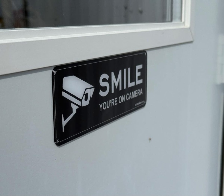 Security camera sign at a storage facility